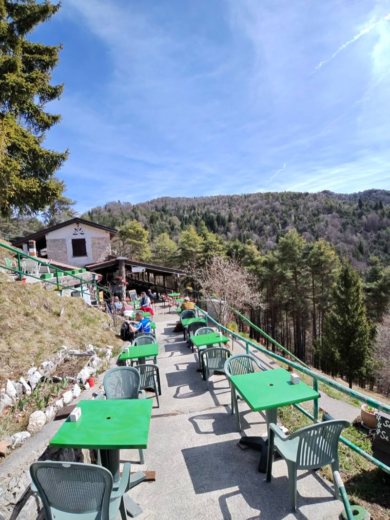 Green tables cascading down hillside at Pedercini